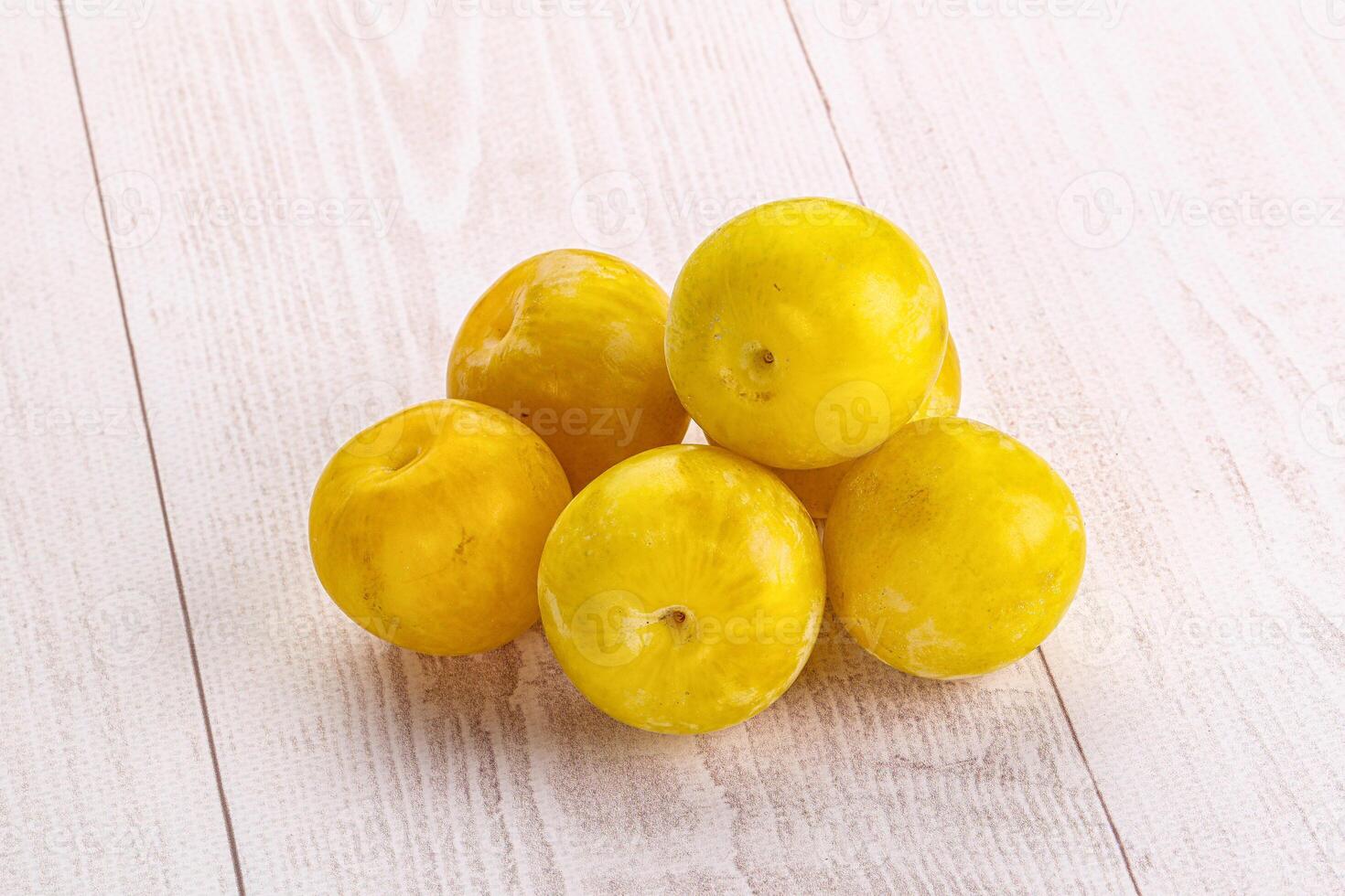 Yellow sweet plum heap fruit photo