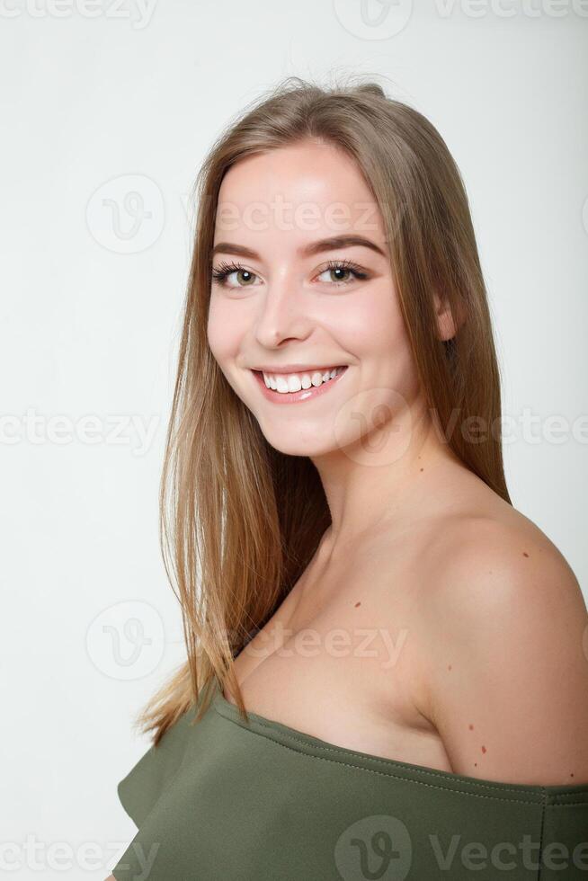 Fashion photo of young magnificent woman. Girl posing. Studio photo