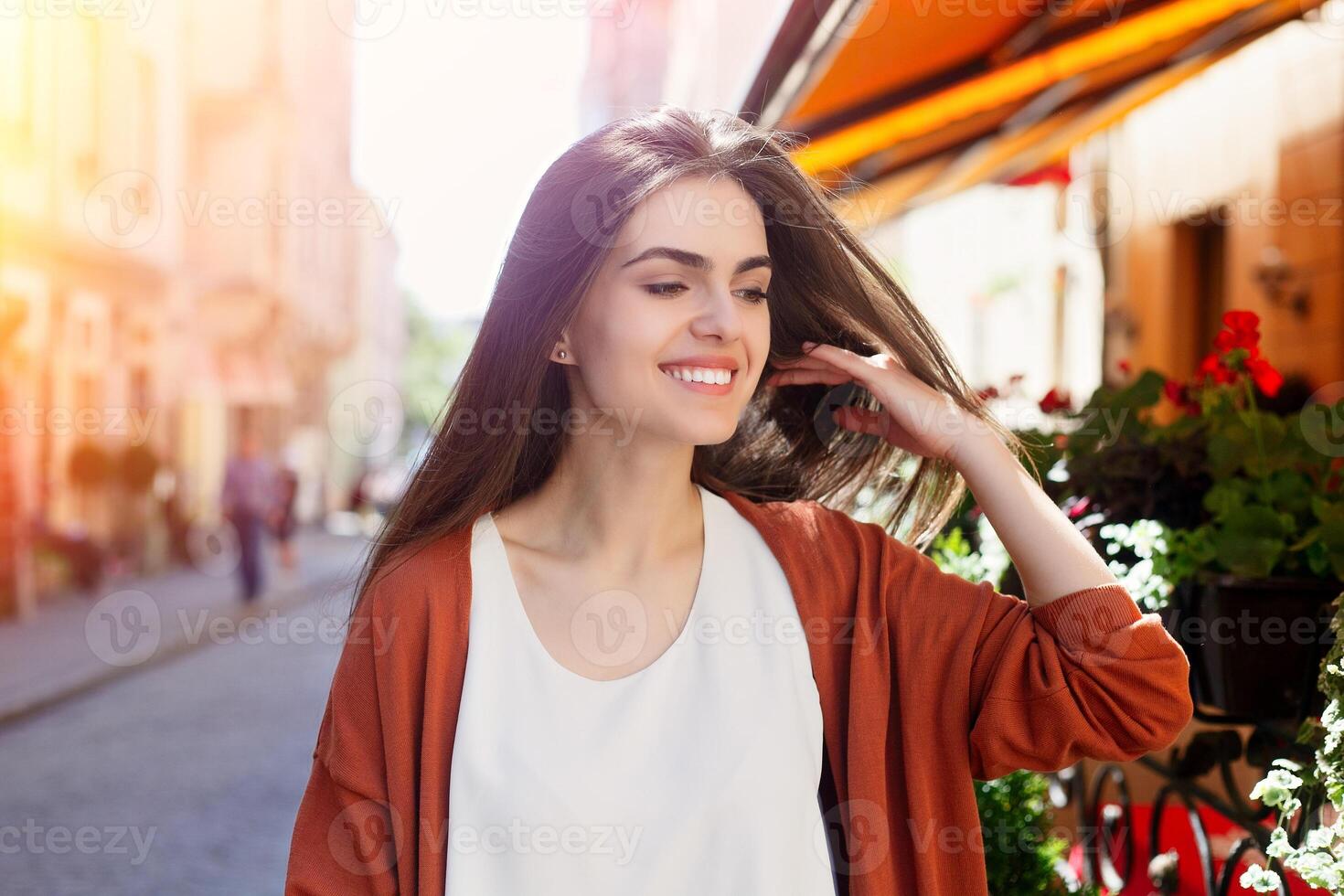 Young beautiful stylish woman walking photo