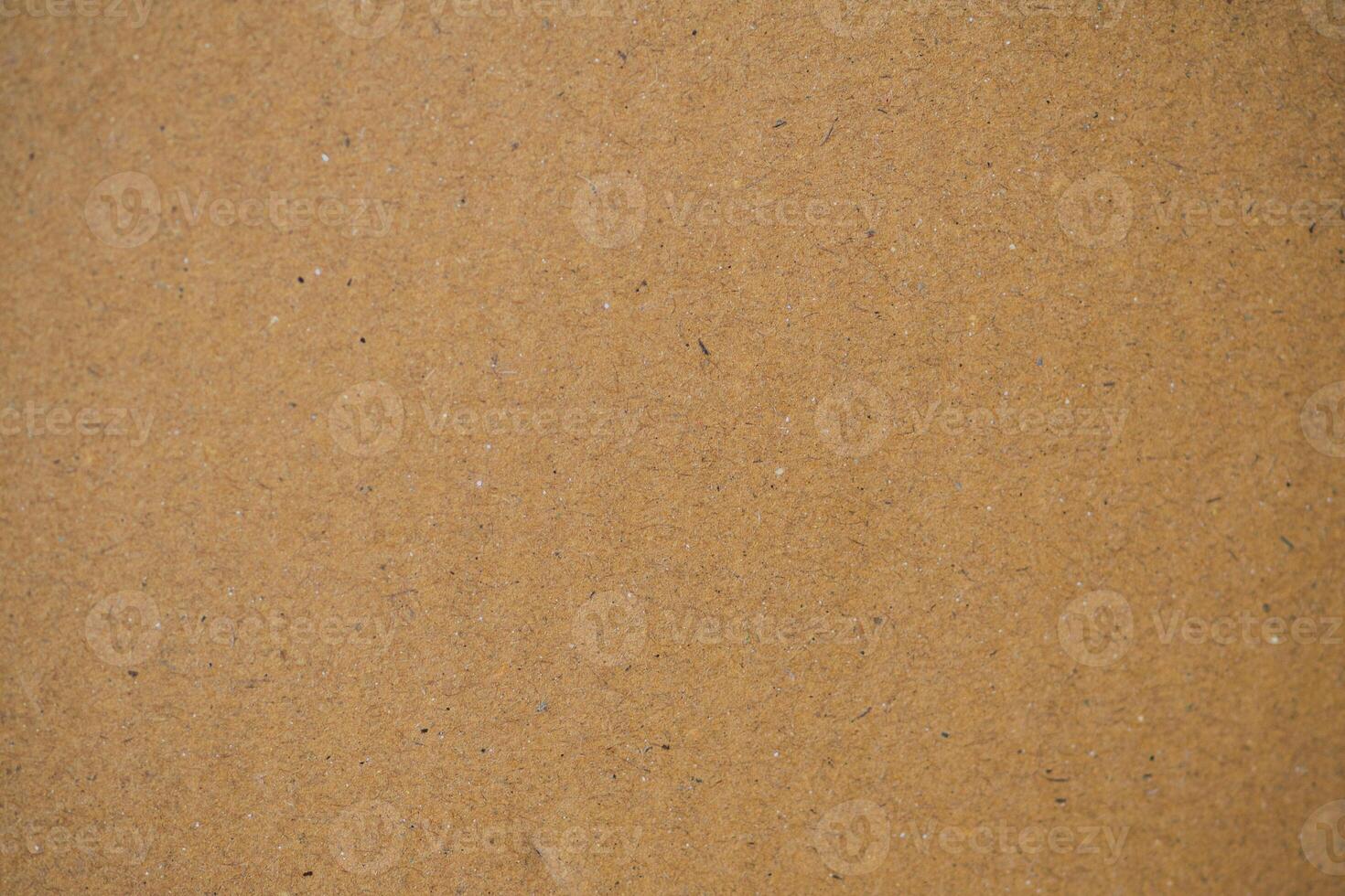 Brown vintage cardboard texture with a rough and grunge surface photo