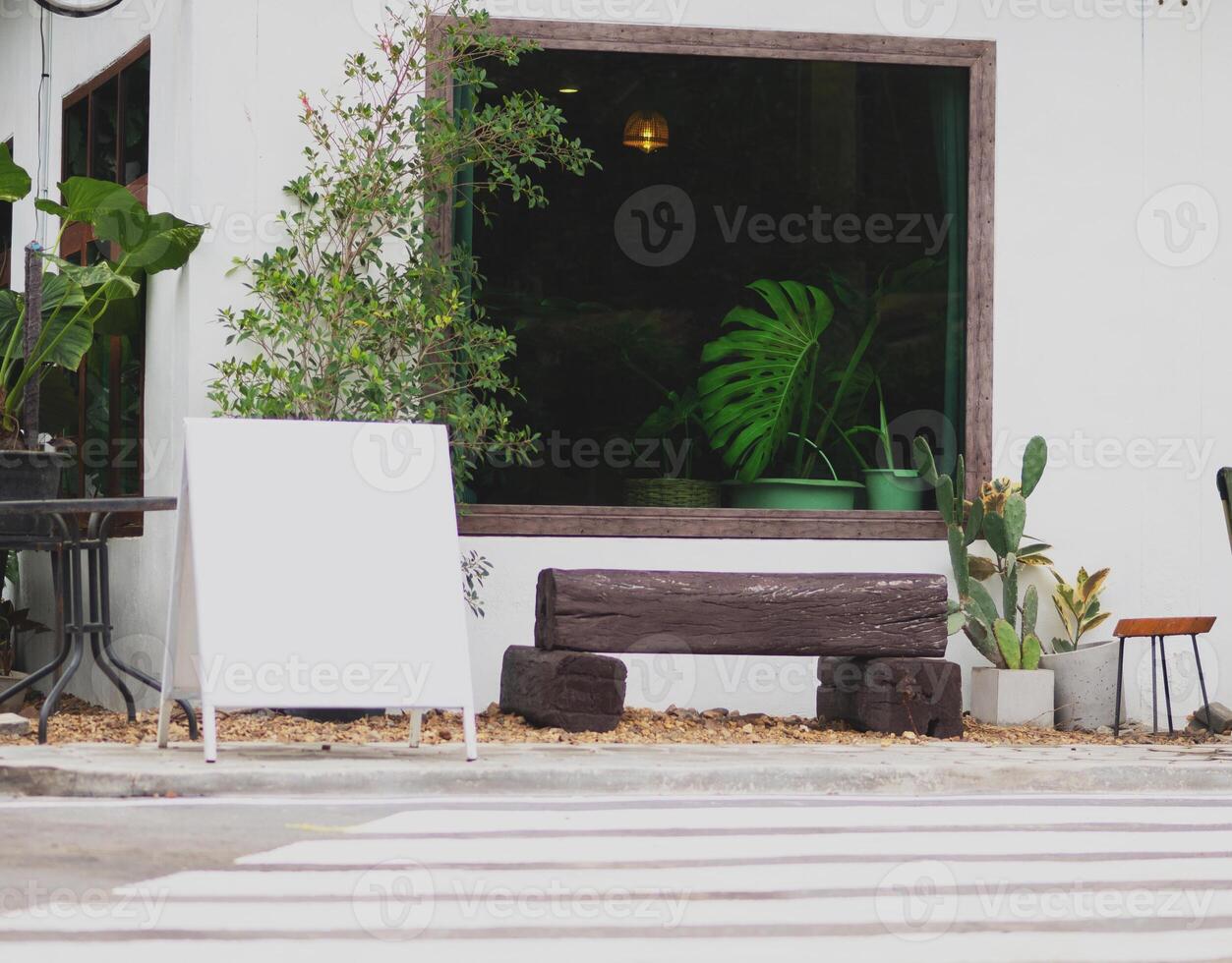 Table and chairs on a terrace in a cafe photo