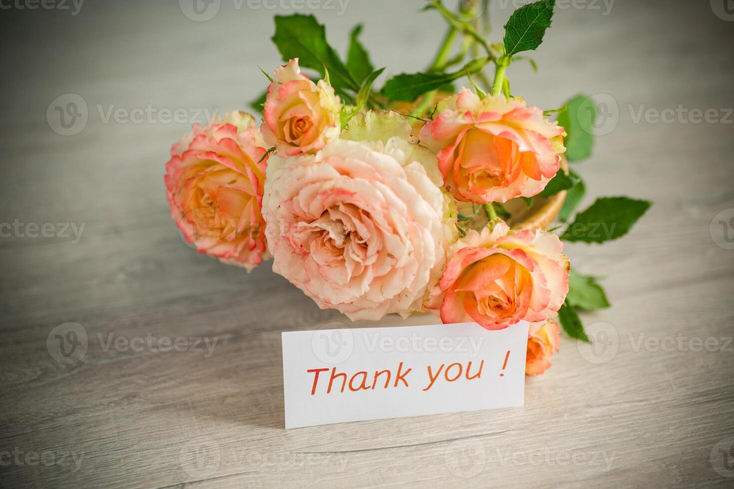 bouquet of beautiful orange roses on table photo