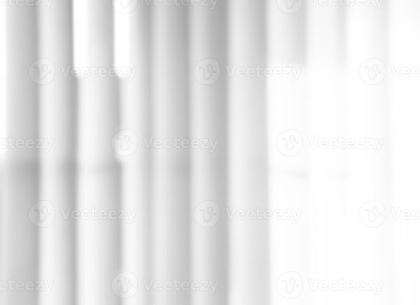 Blurry Light and shadows lines from curtain on the white wall. Sunny day with sun rays reflection from window. Element design for Mockup, Copy space for text photo