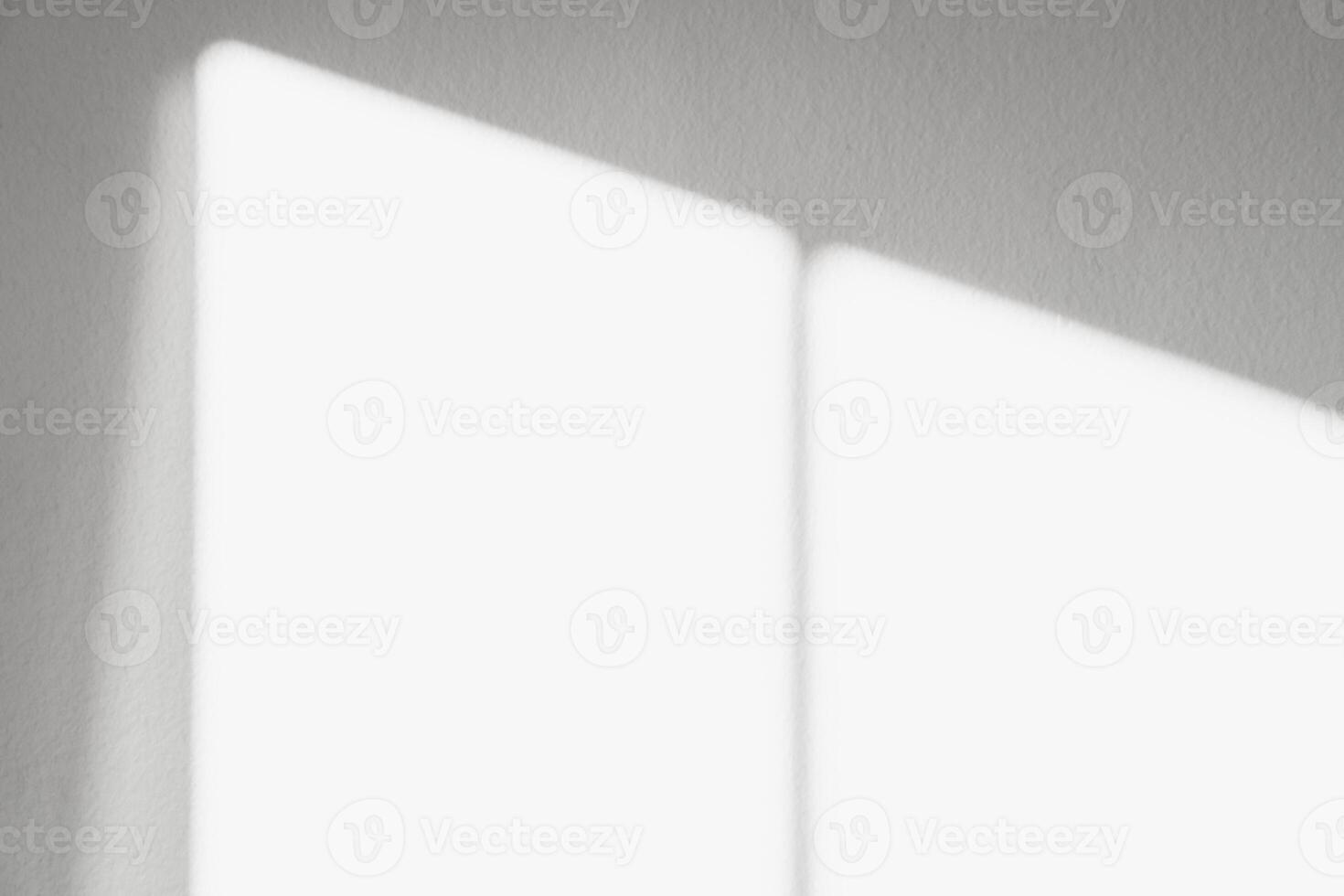 Grey background with bright light of Window frame Shadow on concrete wall surface texture,Empty Grey Cement Studio room with Sunlight reflect on plaster paint,Backdrop for Product Design photo