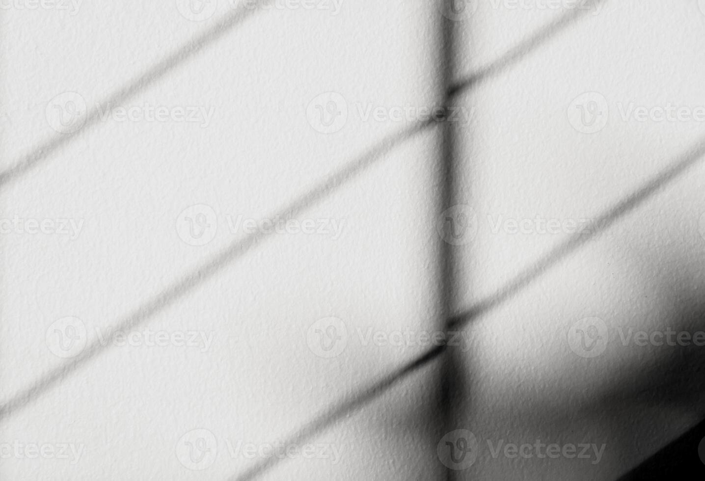 Grey background with bright light of Window frame Shadow on concrete wall surface texture,Empty White Cement Studio room with Sunlight reflect on plaster paint,Backdrop for Product Design Present photo