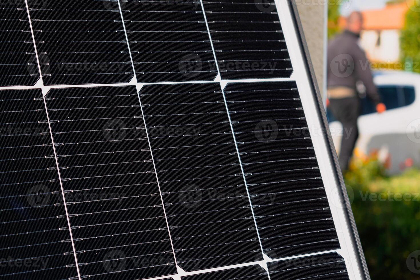 Solar panels on a well-exposed wall of an individual house, making savings following the energy crisis, eco-citizen gesture, green energy photo