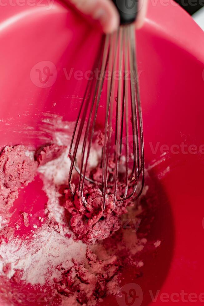 Child having fun modeling salt dough, authentic activity with natural pink coloring beet juice, fine motor skills development photo