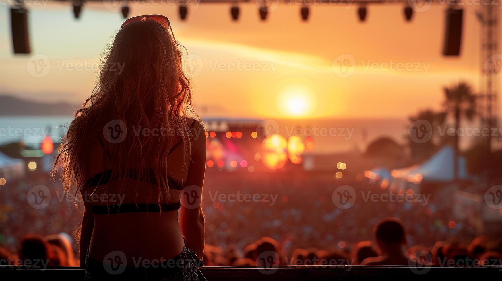 AI Generated A group of teenagers are seated before the stage of a music festival in the summer photo