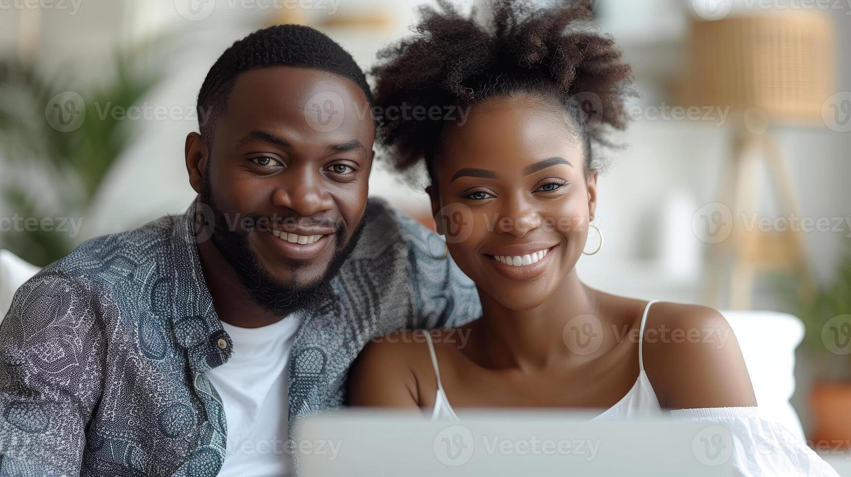 AI Generated A happy business couple looking at a laptop computer isolated on a white background photo