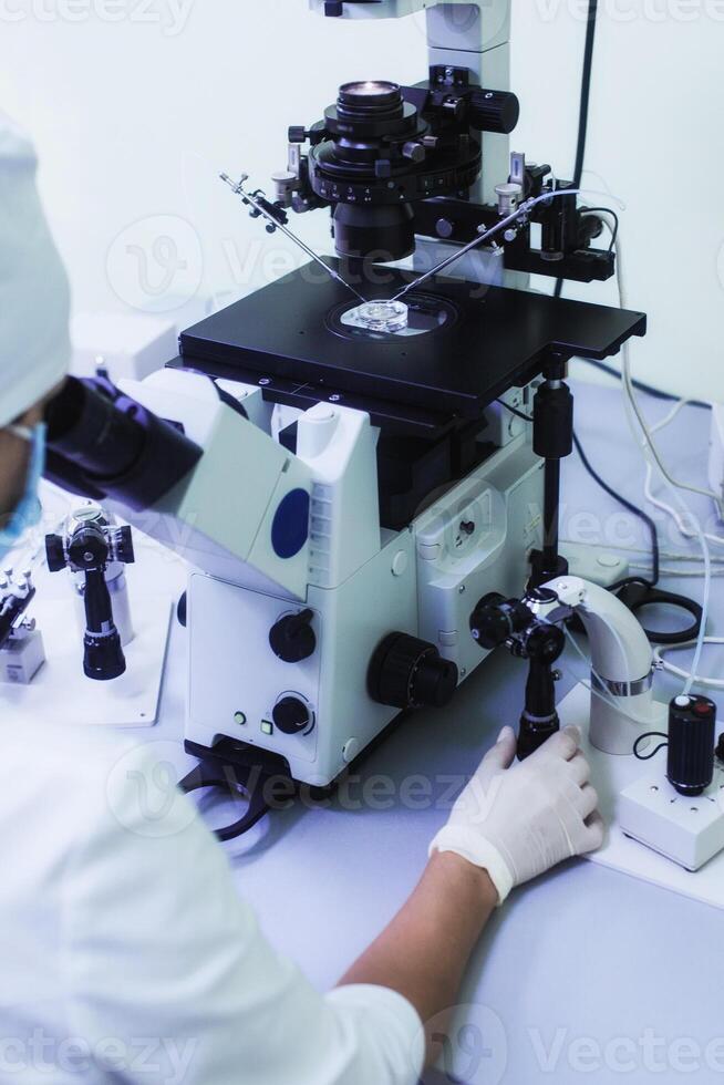 Equipment on laboratory of Fertilization, IVF. Microscope of reproductive medicine clinic fertilizing egg outside female body. Disease laboratory research photo