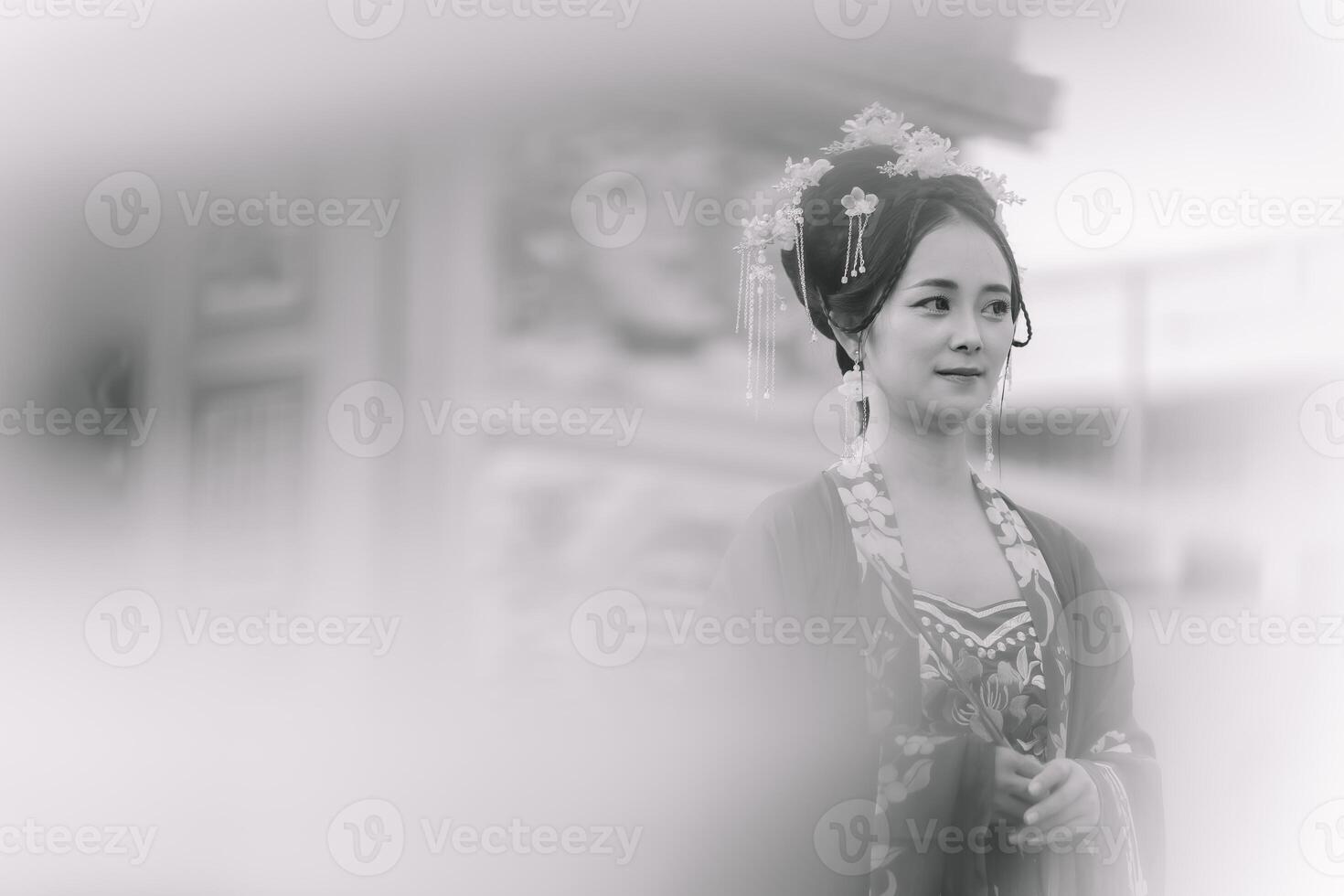 Woman dress China New year. portrait of a woman. person in traditional costume. woman in traditional costume. Beautiful young woman in a bright red dress and a crown of Chinese Queen posing. photo