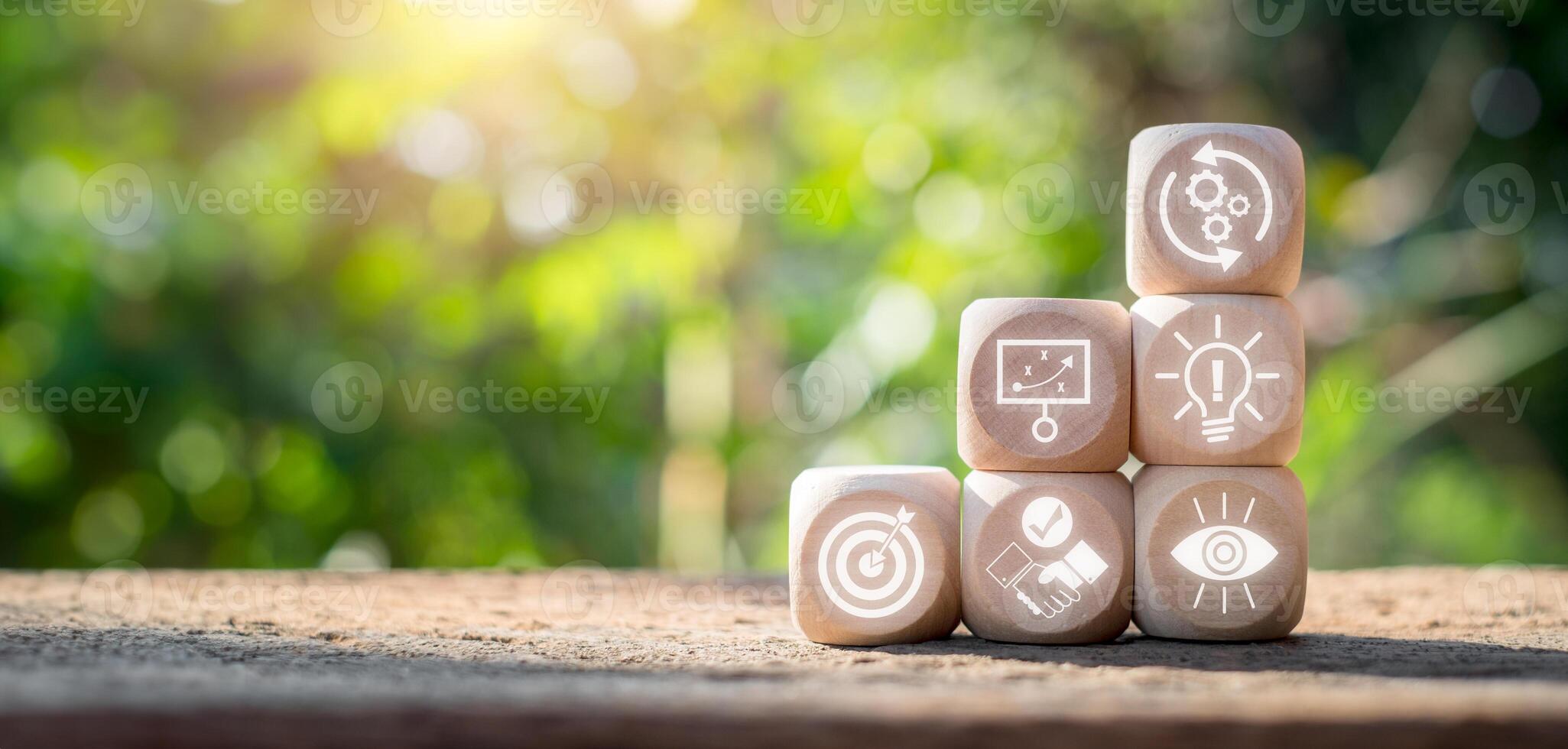 Implementation concept, Wooden block on desk with implementation icon on virtual screen. Opportunity, Goal, Planning, Vision, Strategy, Process, Problem Solving, Success. photo