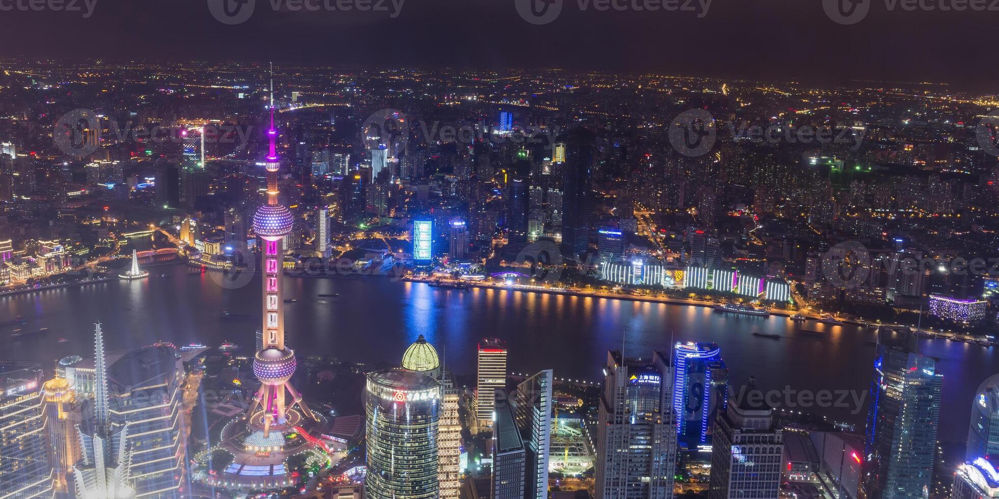 View over Pudong financial district at night, Shanghai, China photo