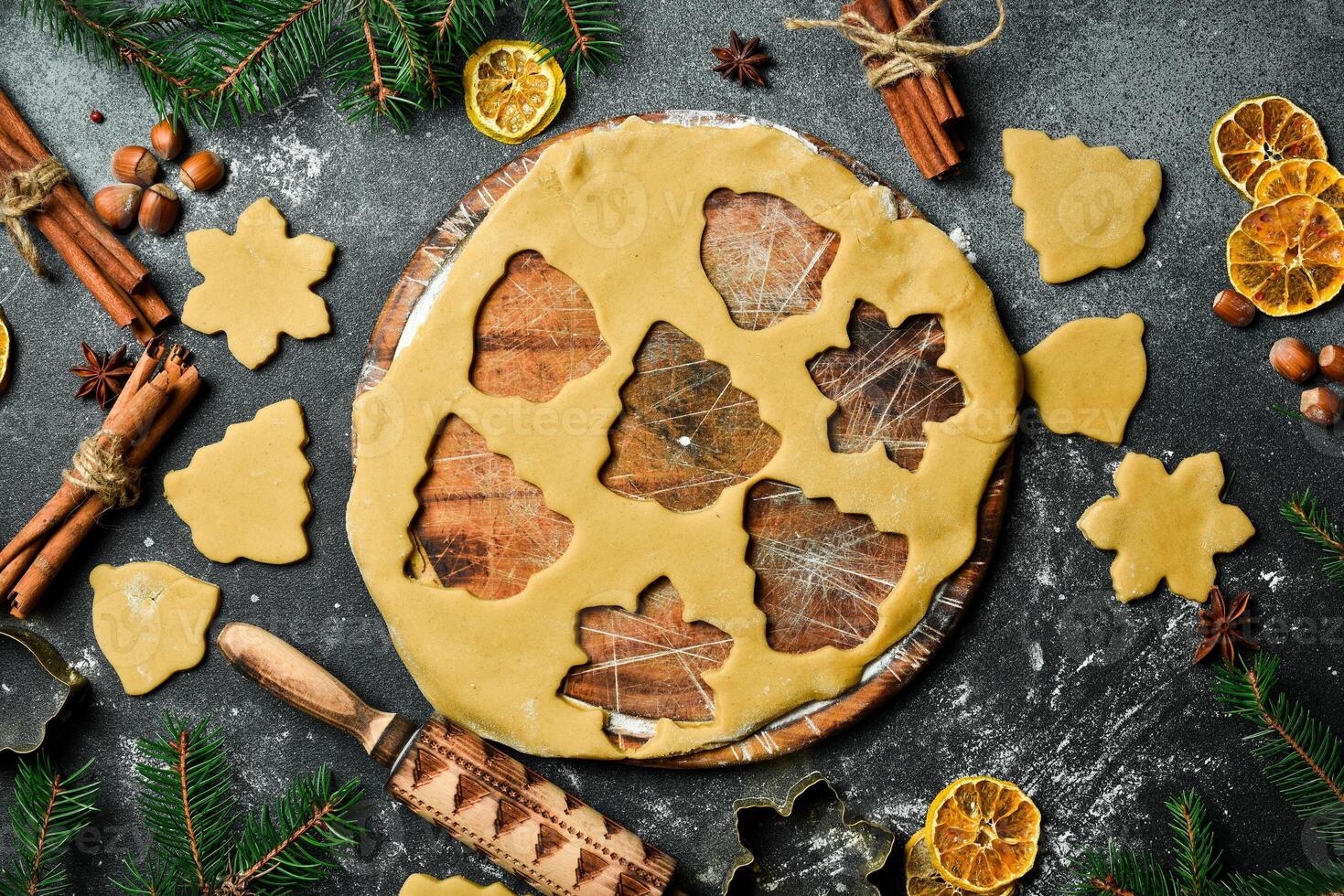 Preparation of Christmas pastries and sweets. Dough for baking homemade ginger cookies. Free space for text. photo