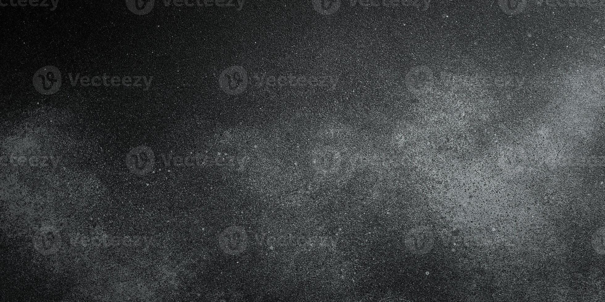 Graphite grunge stone background with copy space for design. Wide banner. Concrete wall surface texture. Top view. photo