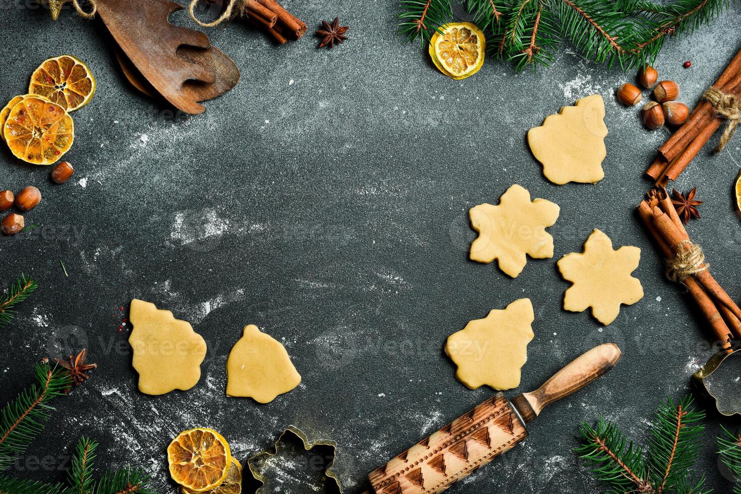 Preparation of Christmas pastries and sweets. Dough for baking homemade ginger cookies. Free space for text. photo