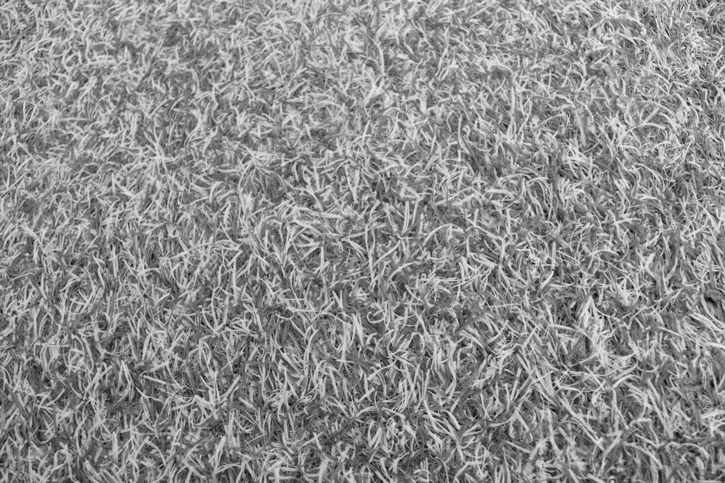 Grunge texture of synthetic grass photo