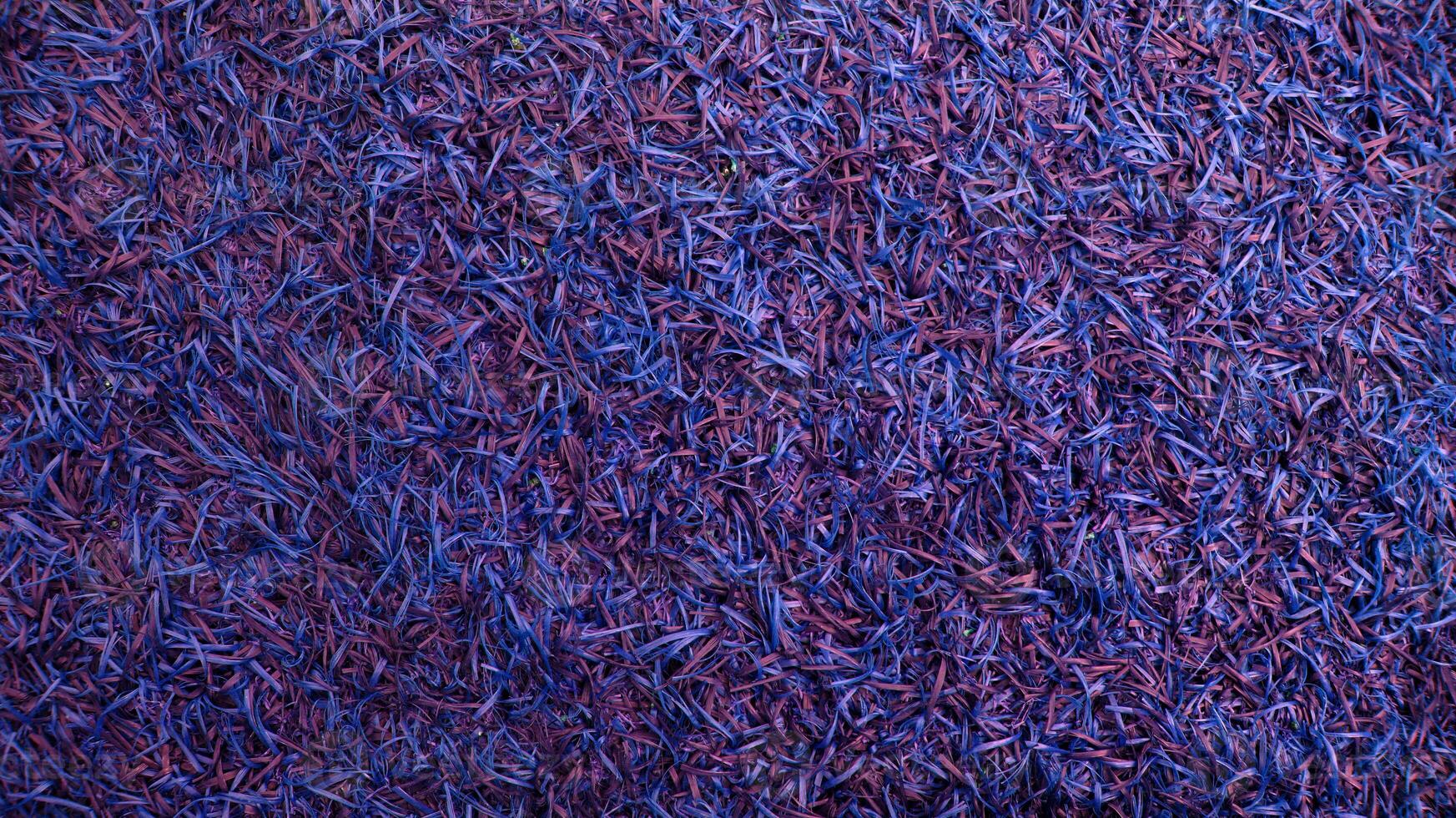 Grunge texture of synthetic grass photo