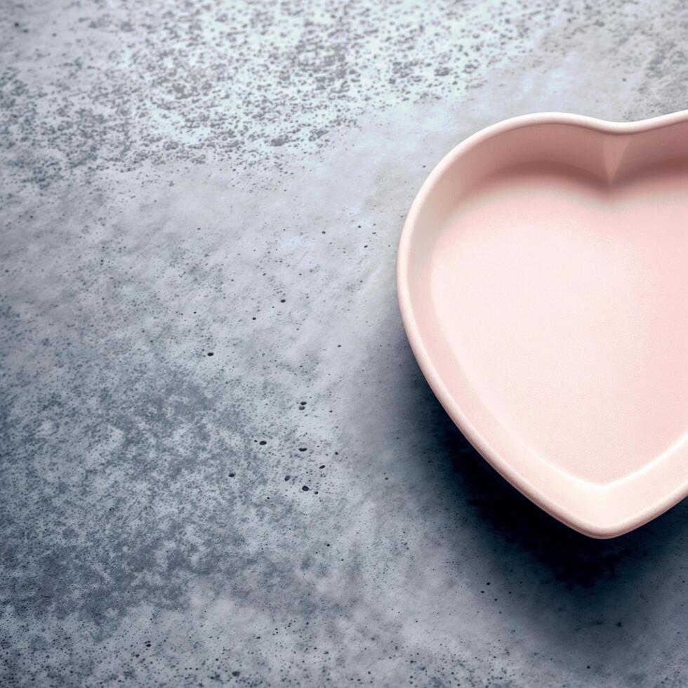AI generated A white heart-shaped plate sits empty on a surface. ai generative photo