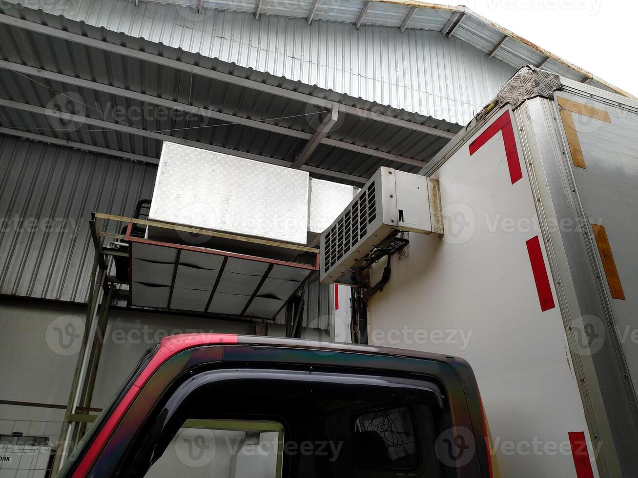 Logistics truck car with cooler box in industrial area. photo