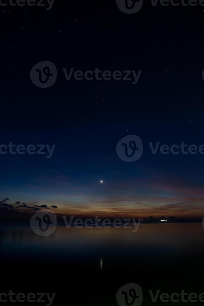 Twilight sky at the lake photo