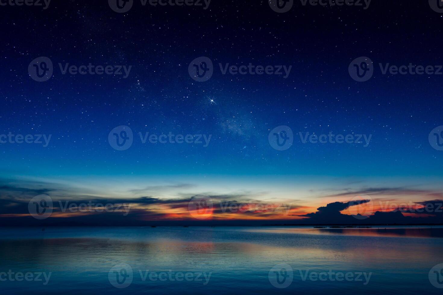 Twilight sky at the lake photo