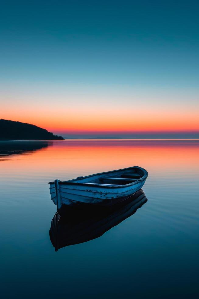 ai generado un solitario barco a la deriva en un sereno, vidrioso lago a el descanso de amanecer foto