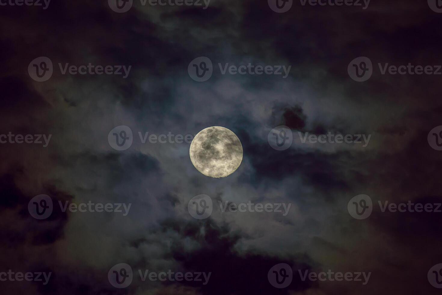 The full moon in the dark cloud. photo