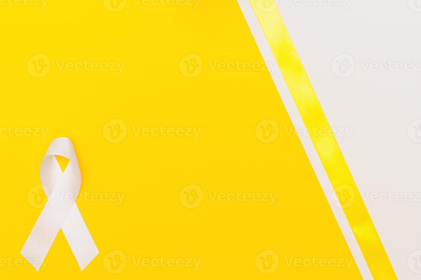 White ribbon awareness for aids day concept. yellow-blue background photo