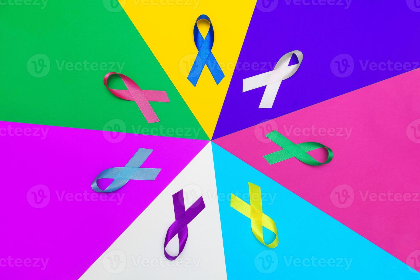 World cancer day background. Colorful ribbons, cancer awareness. multi-colored surface. photo