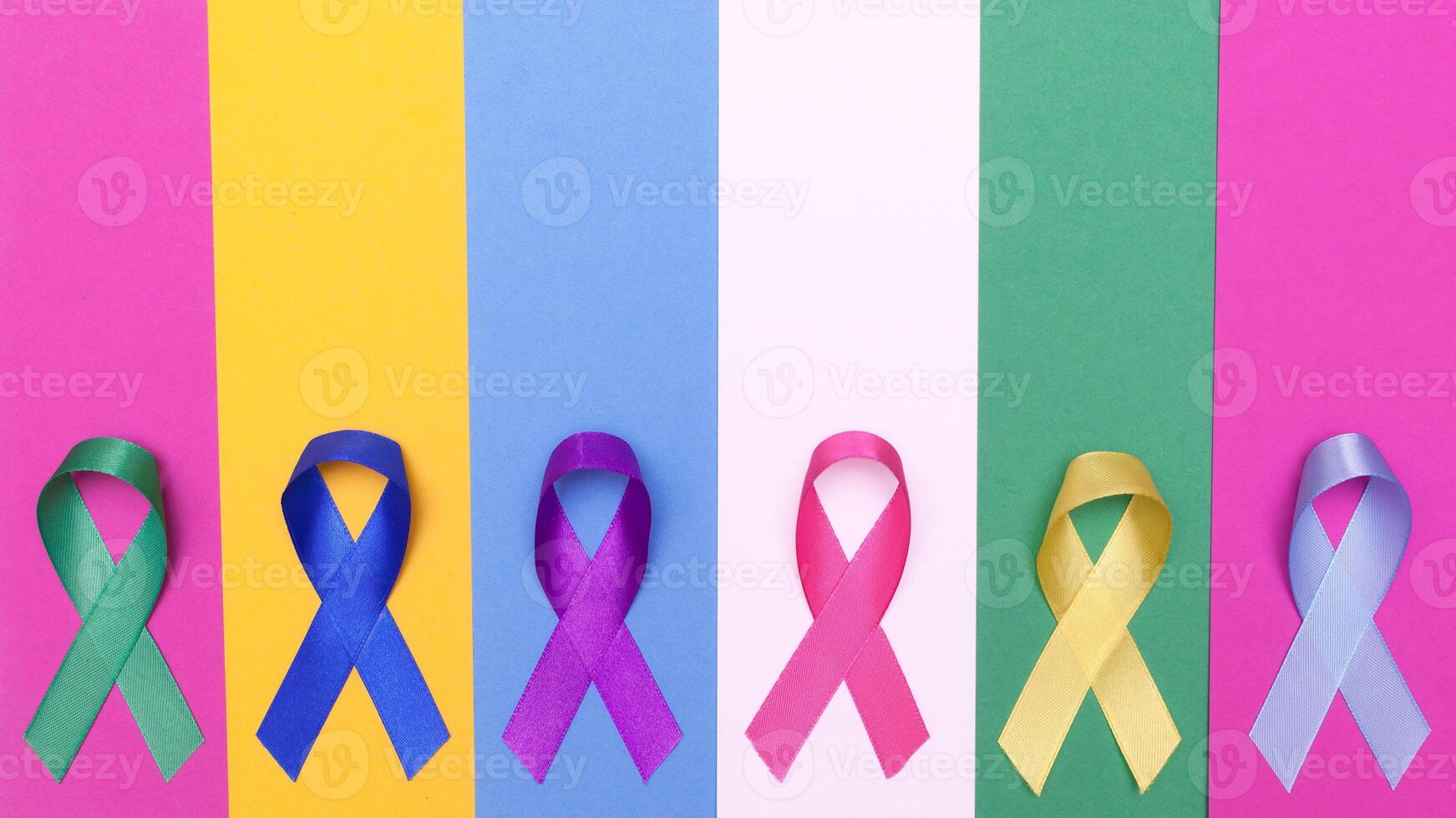 World cancer day background. Colorful ribbons, cancer awareness. multi-colored surface. International Agency for Research on Cancer. photo