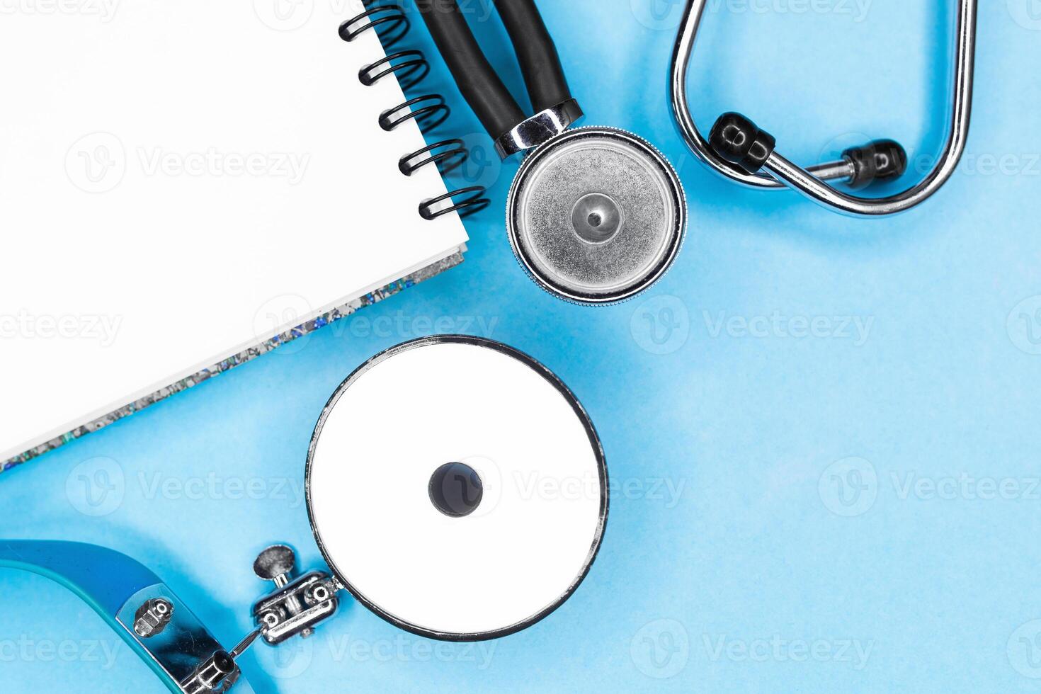 Stethoscope on blue background photo