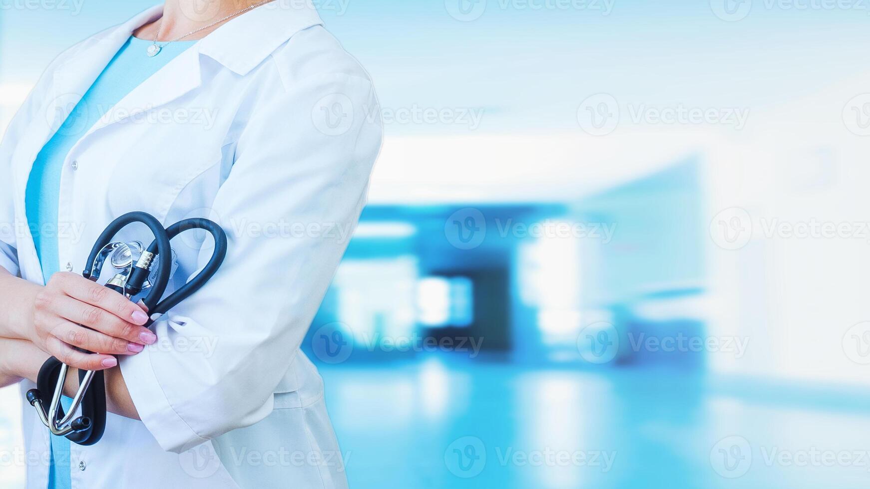 Female Doctor in the Hospital or Office. Concept Of Medical Technology and Healthcare Business. Blue Background photo