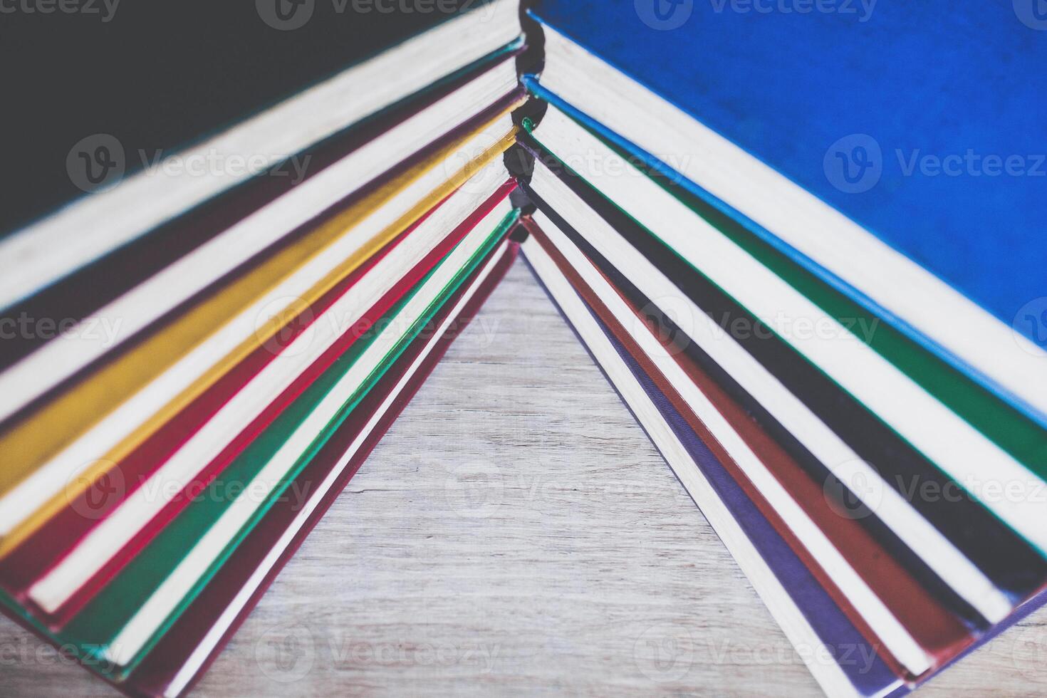 Background of multicolored roots of old books. Copy space. photo