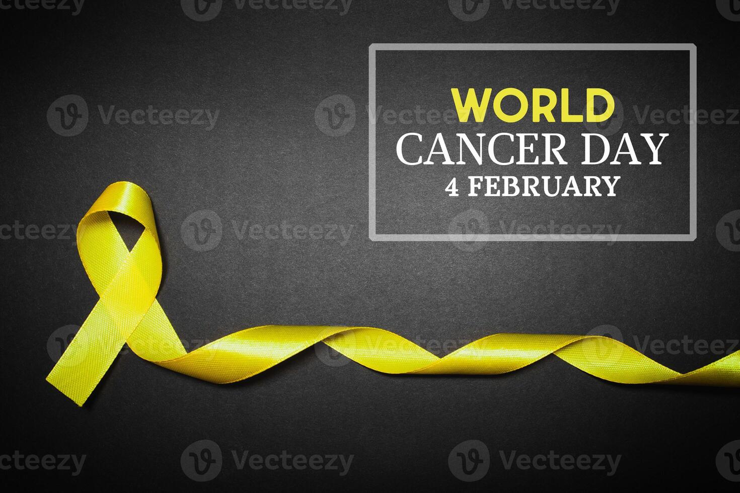 World cancer day concept on dark background. support for children with cancer photo