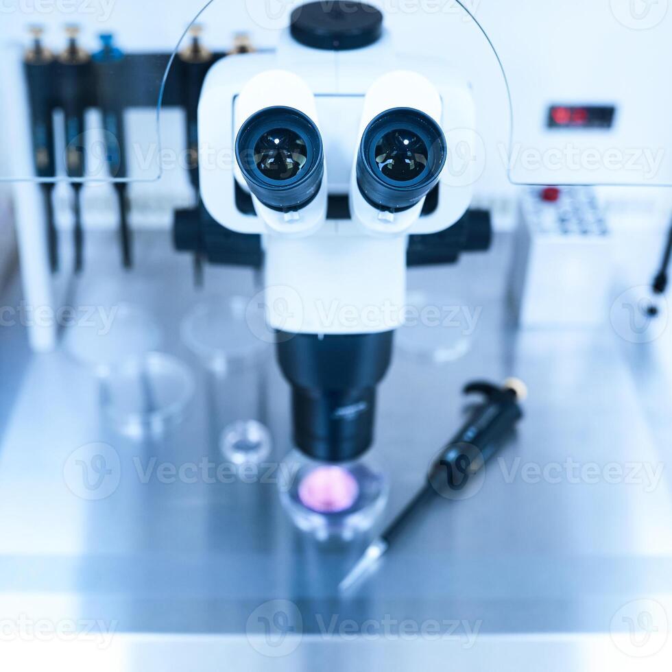 Equipment on laboratory of Fertilization, IVF. Microscope of reproductive medicine clinic fertilizing egg outside female body. Disease laboratory research photo