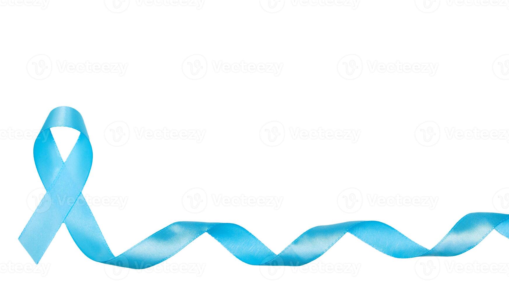 blue cancer awareness ribbon with trail on isolated. concept of health and medicine photo