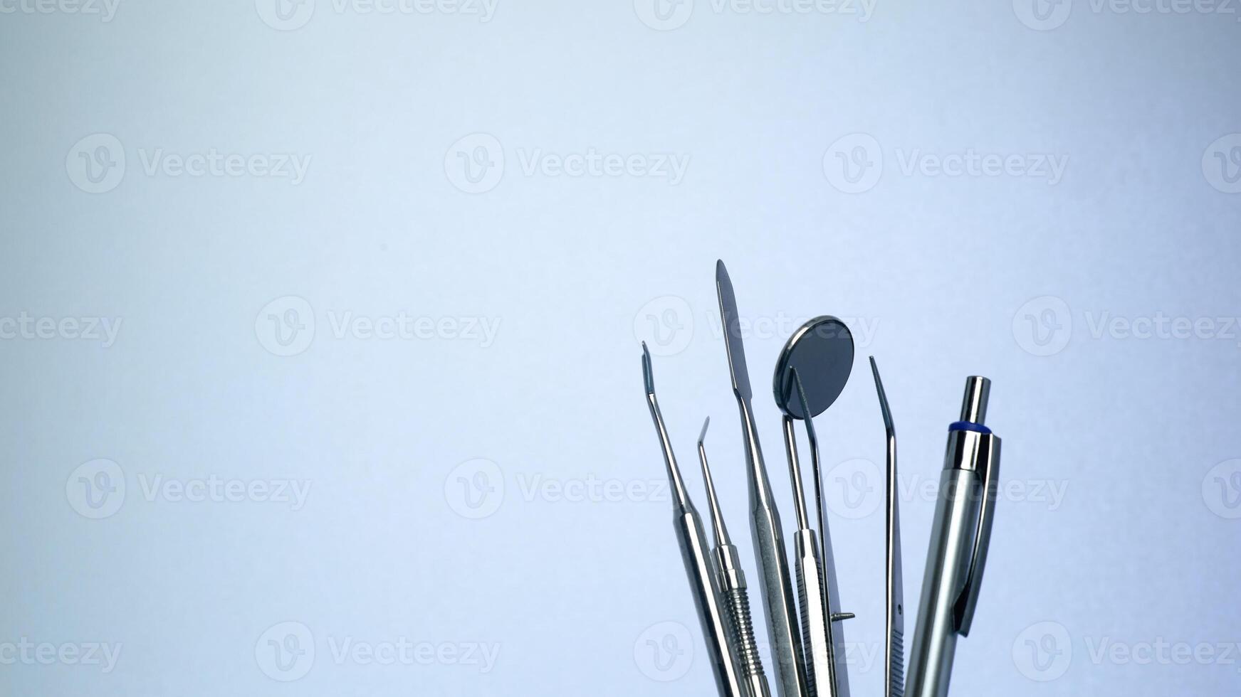 Dental Tools set in blue background photo