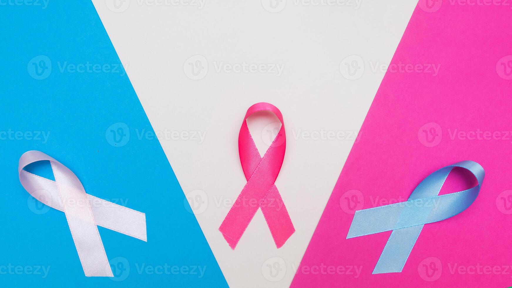 multicolored ribbons supporting cancer patients. The concept of the feast of the fourth of February. photo