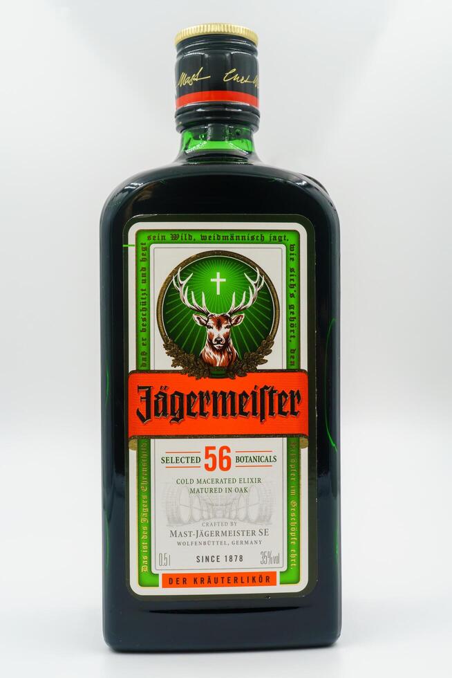 Bishkek, KG, Jan 2024. Bottle Jagermeister, herbal aroma liqueur. Drink has alcohol, herbs and spices. Serving suggestion - digestif and aperitif. Anise, cinnamon, cloves, ginger coriander etc photo