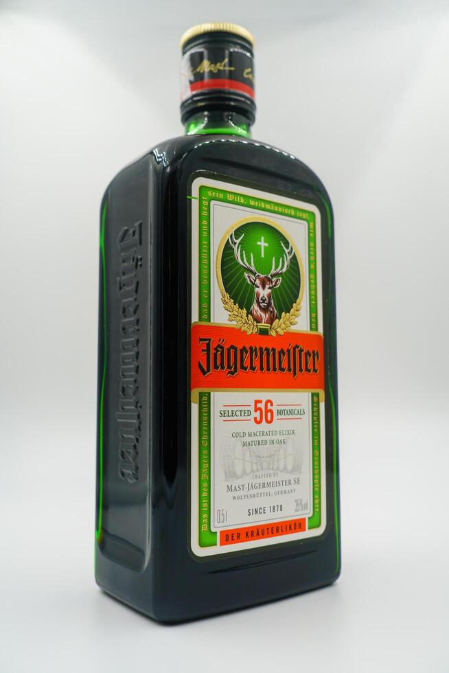 Bishkek, KG, Jan 2024. Bottle Jagermeister, herbal aroma liqueur. Drink has alcohol, herbs and spices. Serving suggestion - digestif and aperitif. Anise, cinnamon, cloves, ginger coriander etc photo