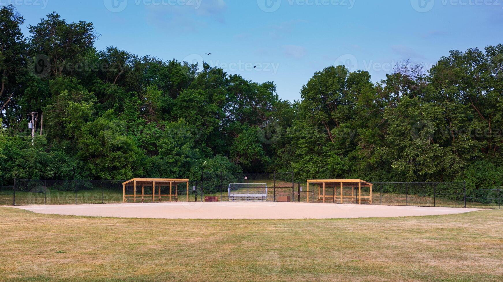 softball diamond in a city park in the early morning photo