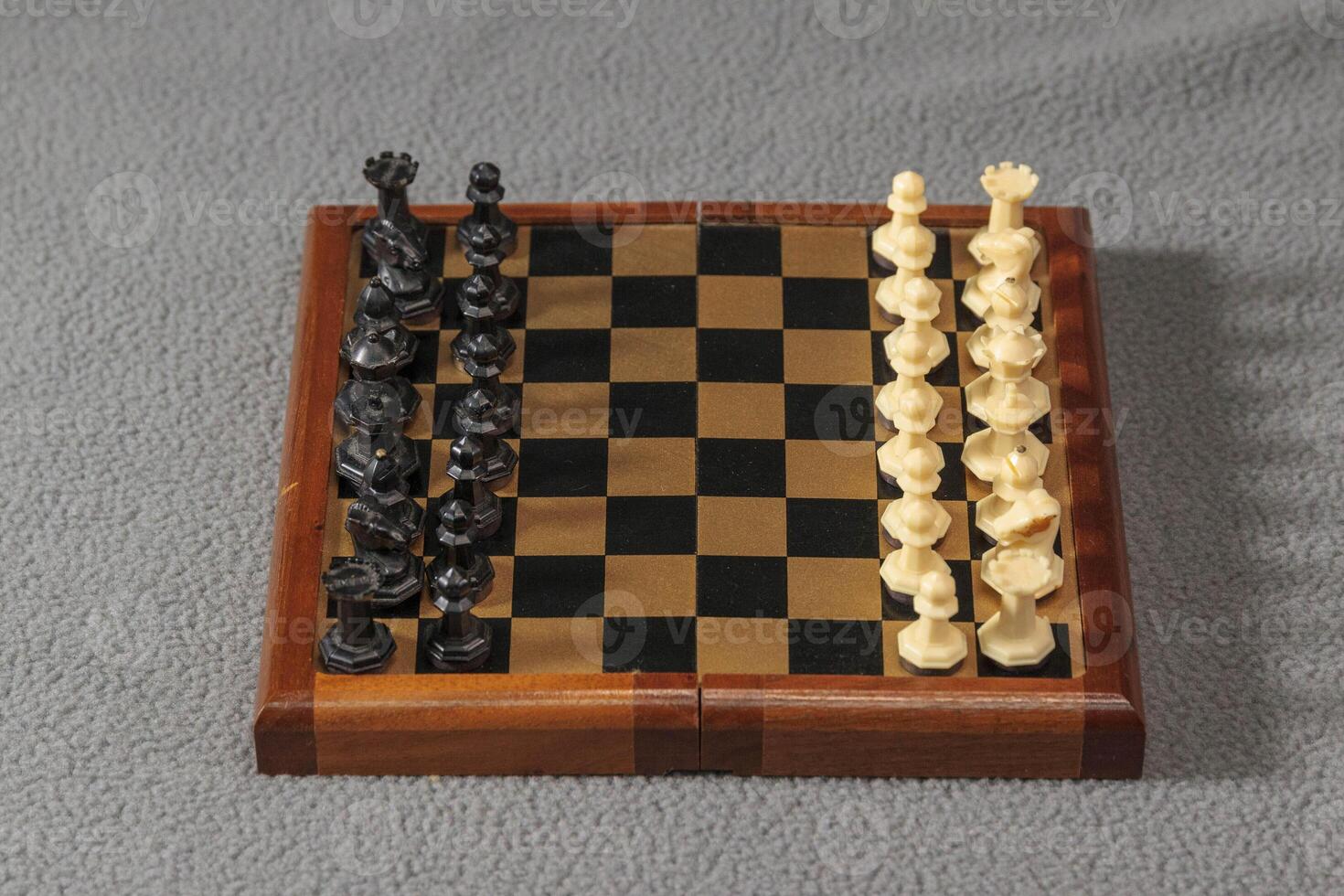 portable and pocket sized chess set all ready for a game photo
