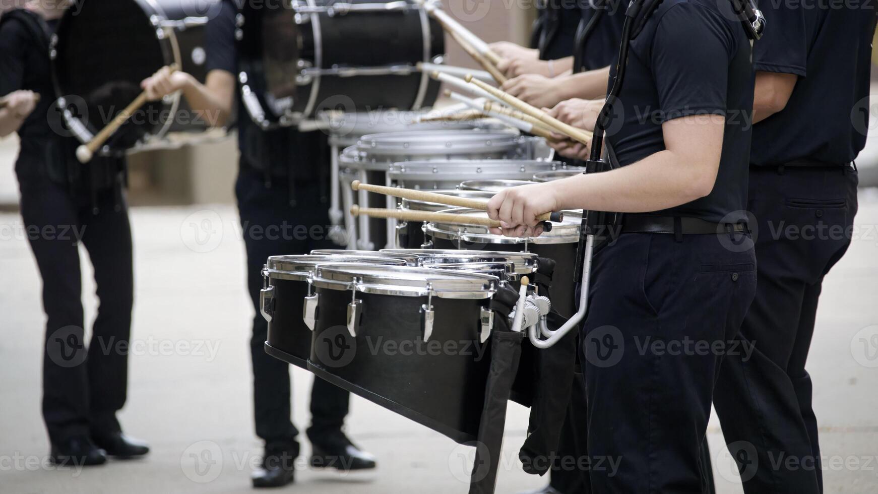 marching band drum line warming up for a parade photo