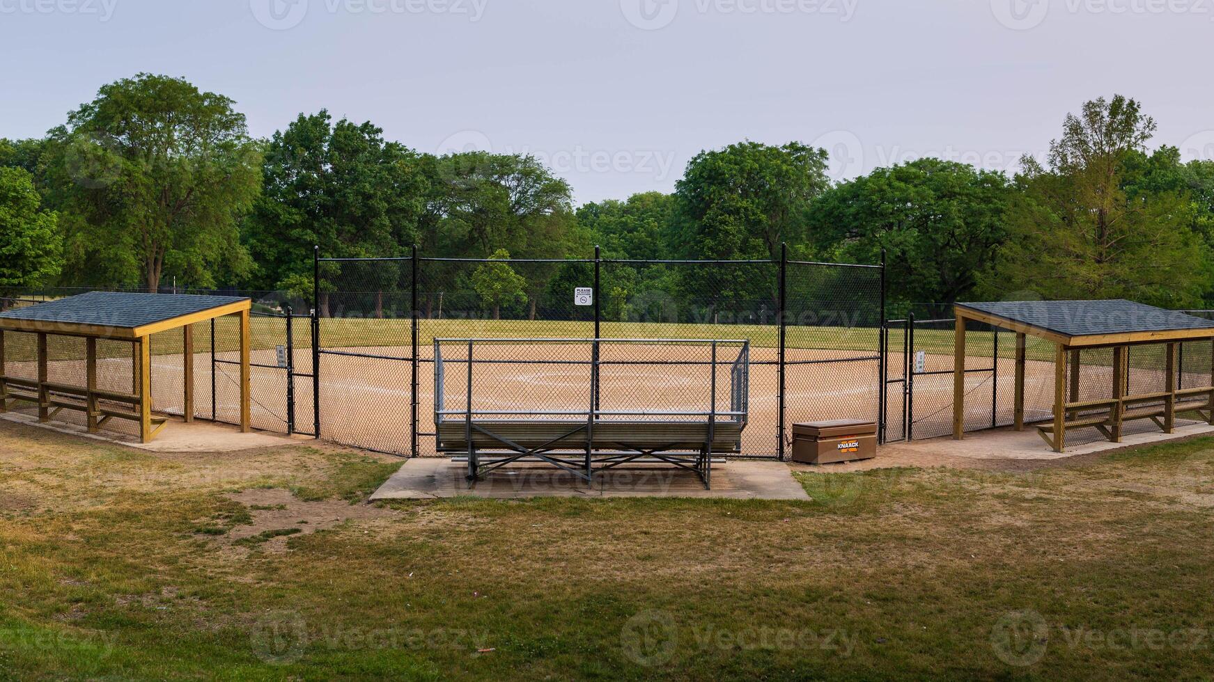 softball diamond in a city park in the early morning photo