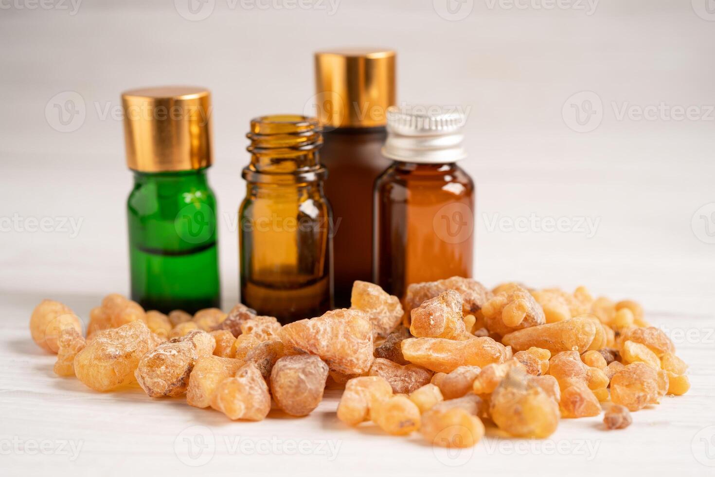 Frankincense or olibanum aromatic resin isolated on white background used in incense and perfumes. photo