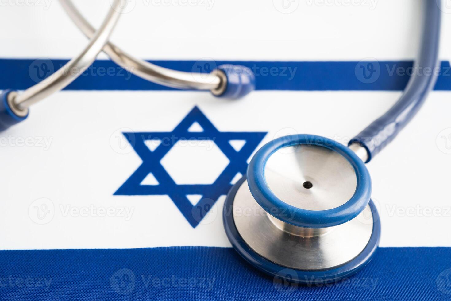 Stethoscope on Israel flag background, Business and finance concept. photo