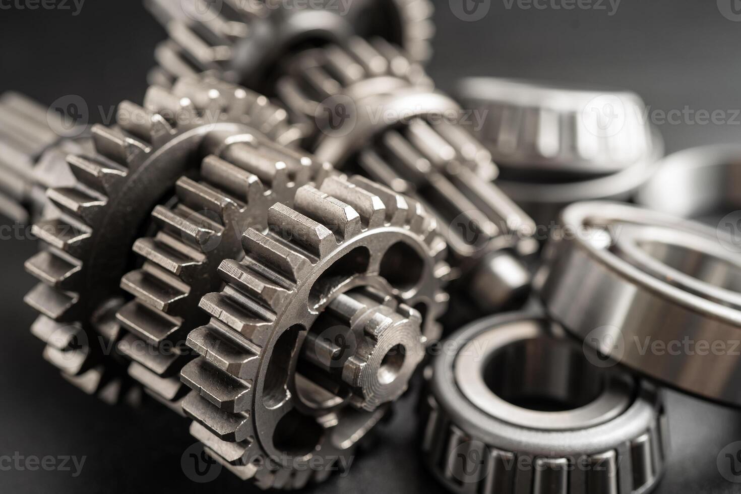engranaje y dientes ruedas, reloj mecanismo, latón metal motor industrial. foto