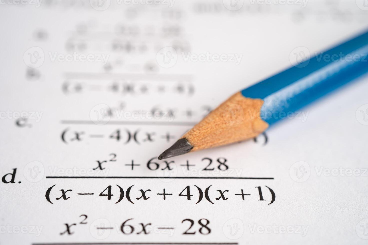 Pencil on mathematic formula exercise test paper in education school. photo