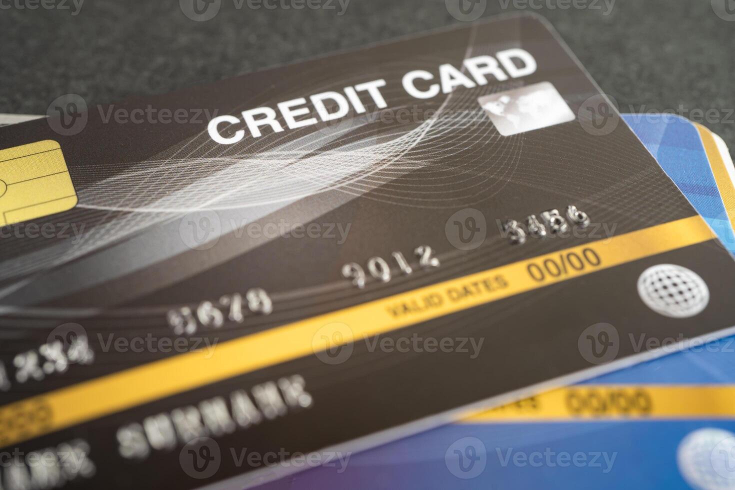 Credit card model on chart and graph paper. Finance development, Banking Account, Statistics, Investment. photo